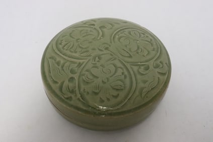 A celadon porcelain covered box