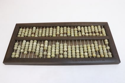 Rosewood abacus with jade like bead