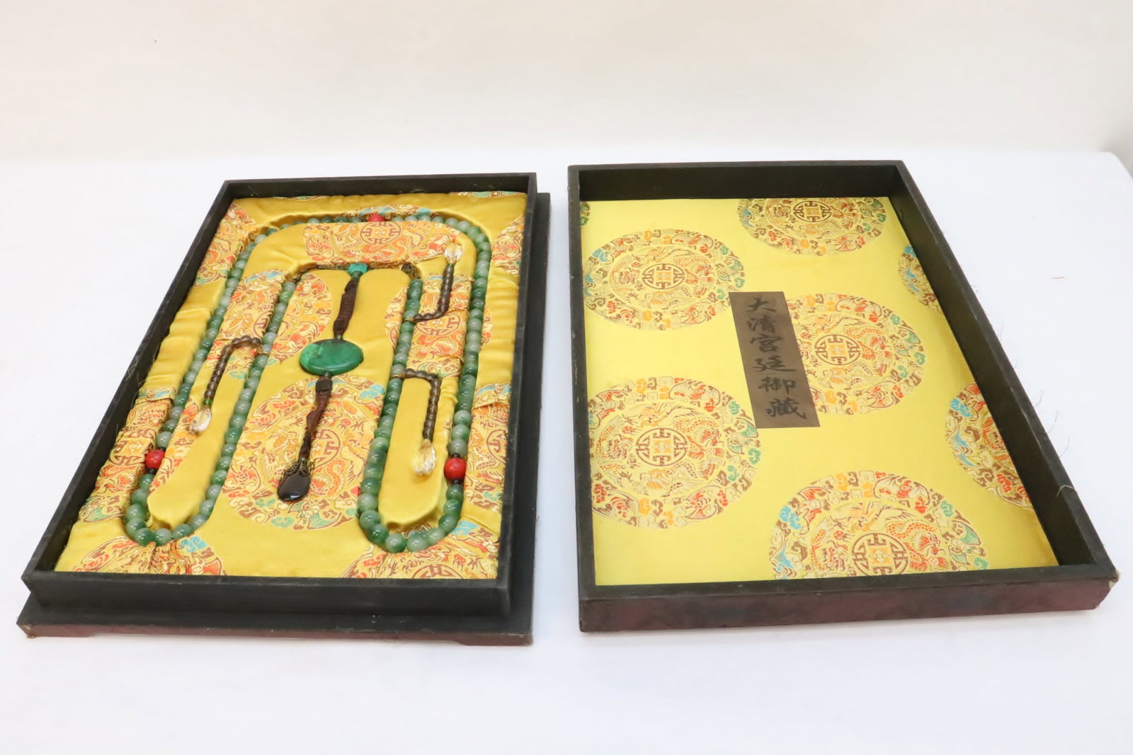 A long necklace in lacquer style box: A long necklace (60"L) in lacquer style box