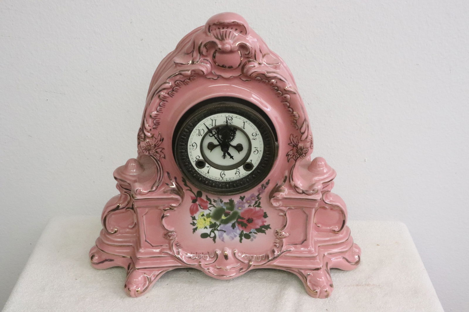 A painted porcelain cased table clock (1 of 11)