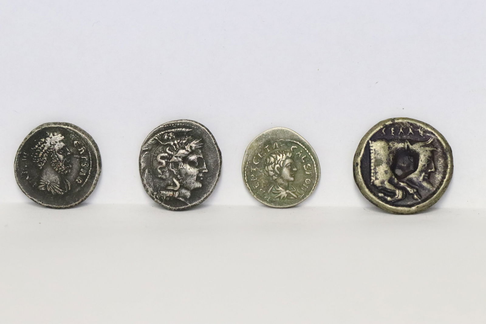 4 assorted ancient coins (1 of 10)