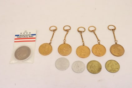 Lot of 1968 Olympic memorabilia coins, and a Northwest Territorial mint coin