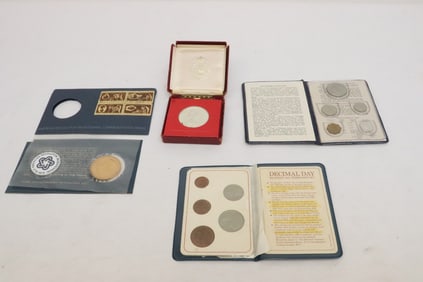 sterling memorabilia coin, panel of British first decimal coins, & a Philippine mint set