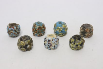 7 porcelain/pottery beads