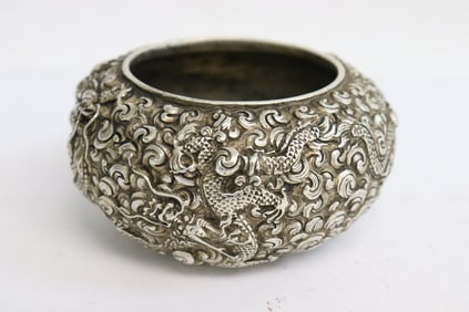 A white bronze brush wash