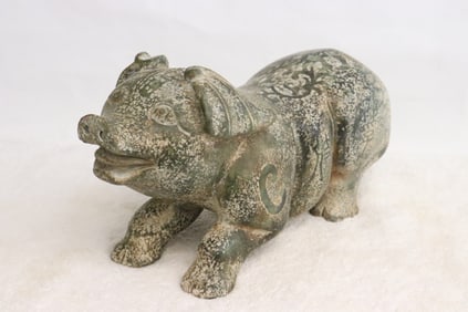 A stone carved pig