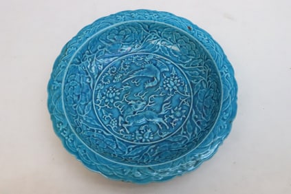 A blue glazed porcelain plate