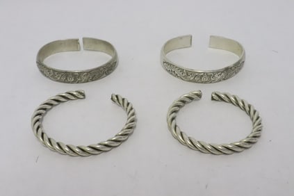 4 white metal bangles