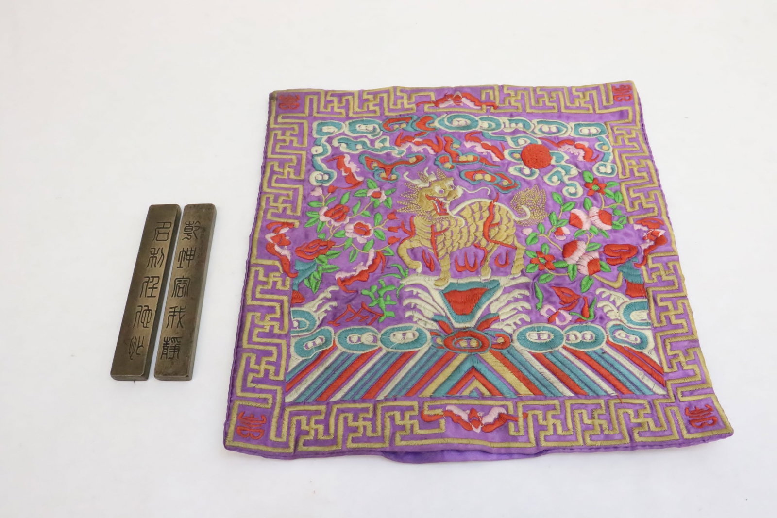 pair bronze scroll weight, & an embroidery panel (1 of 9)