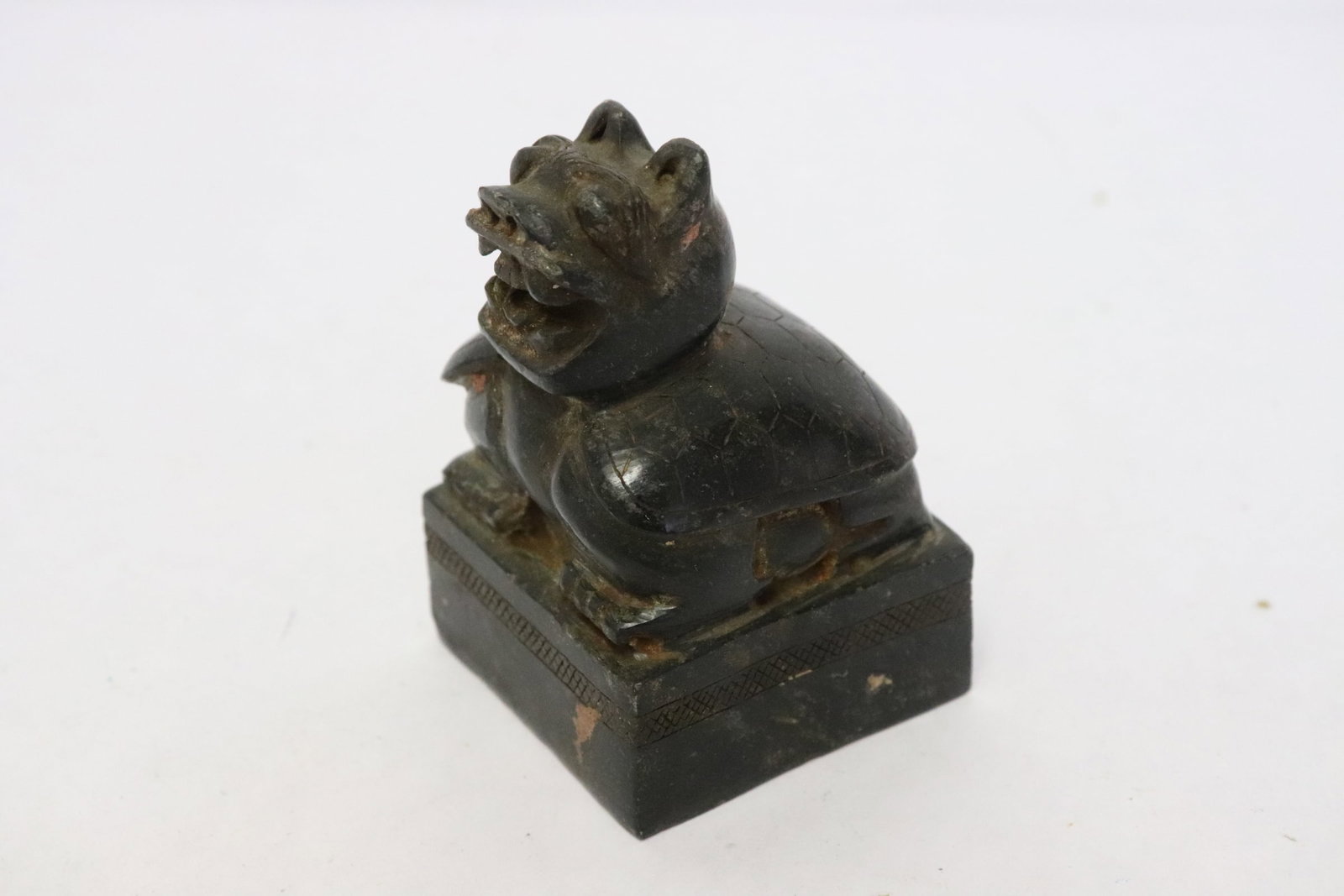 A stone carved seal with qilin motif finial: A stone carved seal with qilin motif finial, 2.95"x1.85"x1.95"
