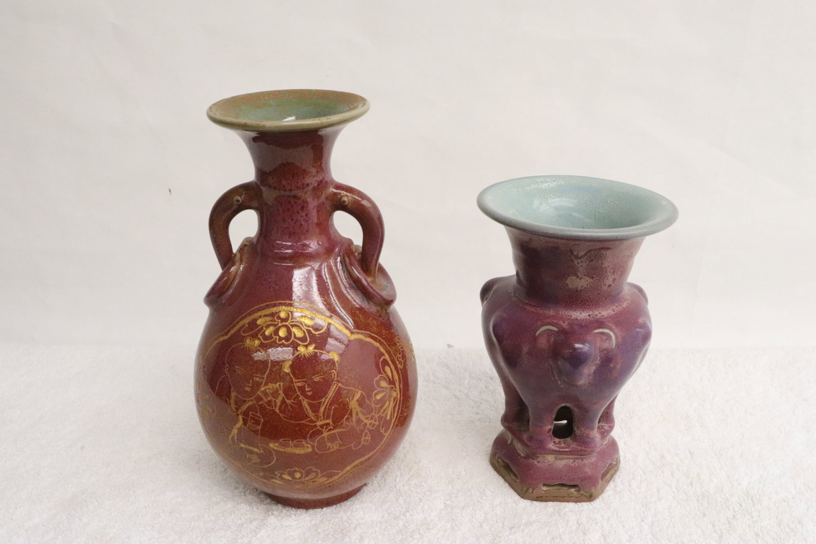 2 red glazed porcelain vases: 2 red glazed porcelain vases, 6.17"x3.7"x3.7", 8"x4.5"dia