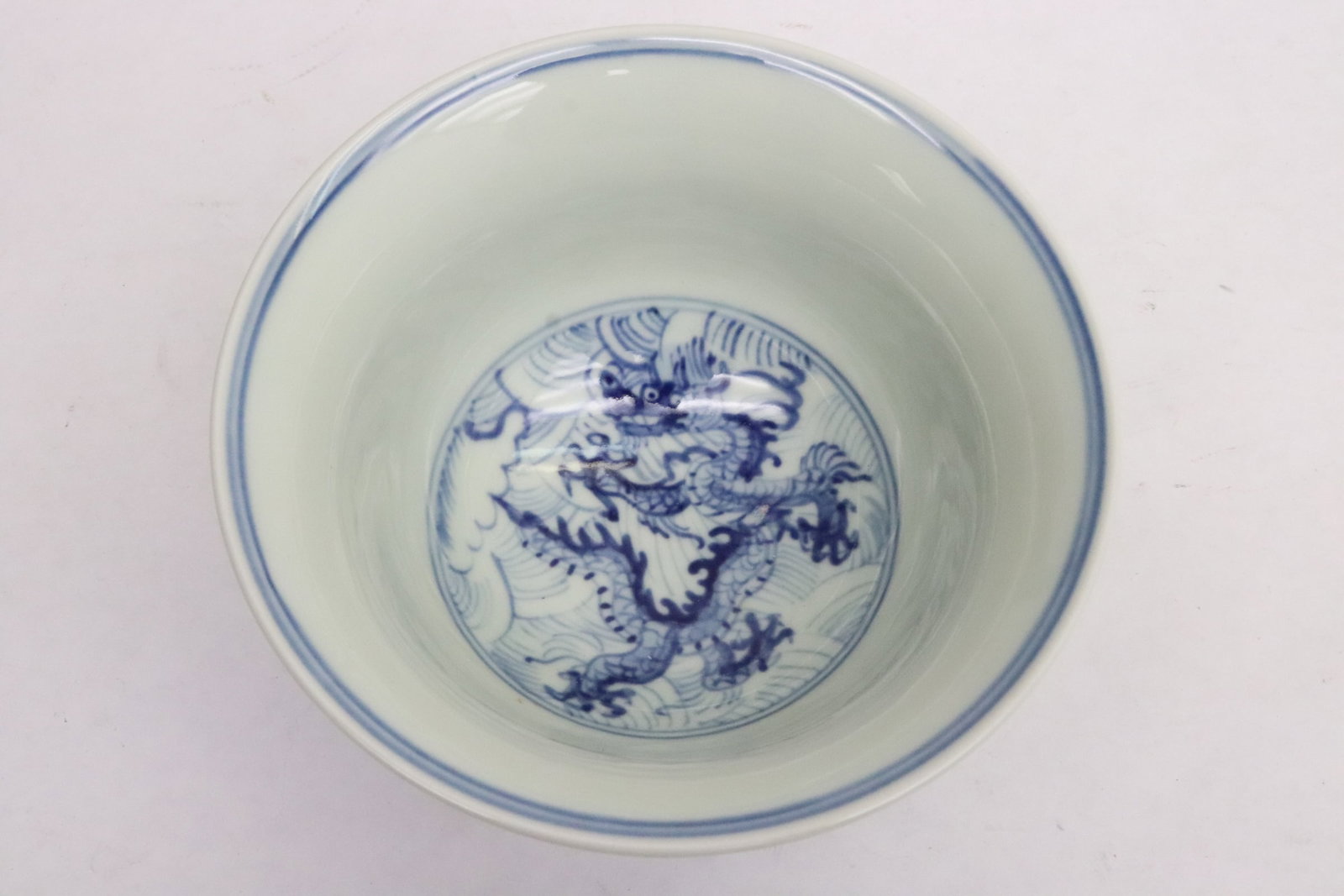 A blue and white porcelain bowl: A blue and white porcelain bowl, 3.25"x5.96"dia