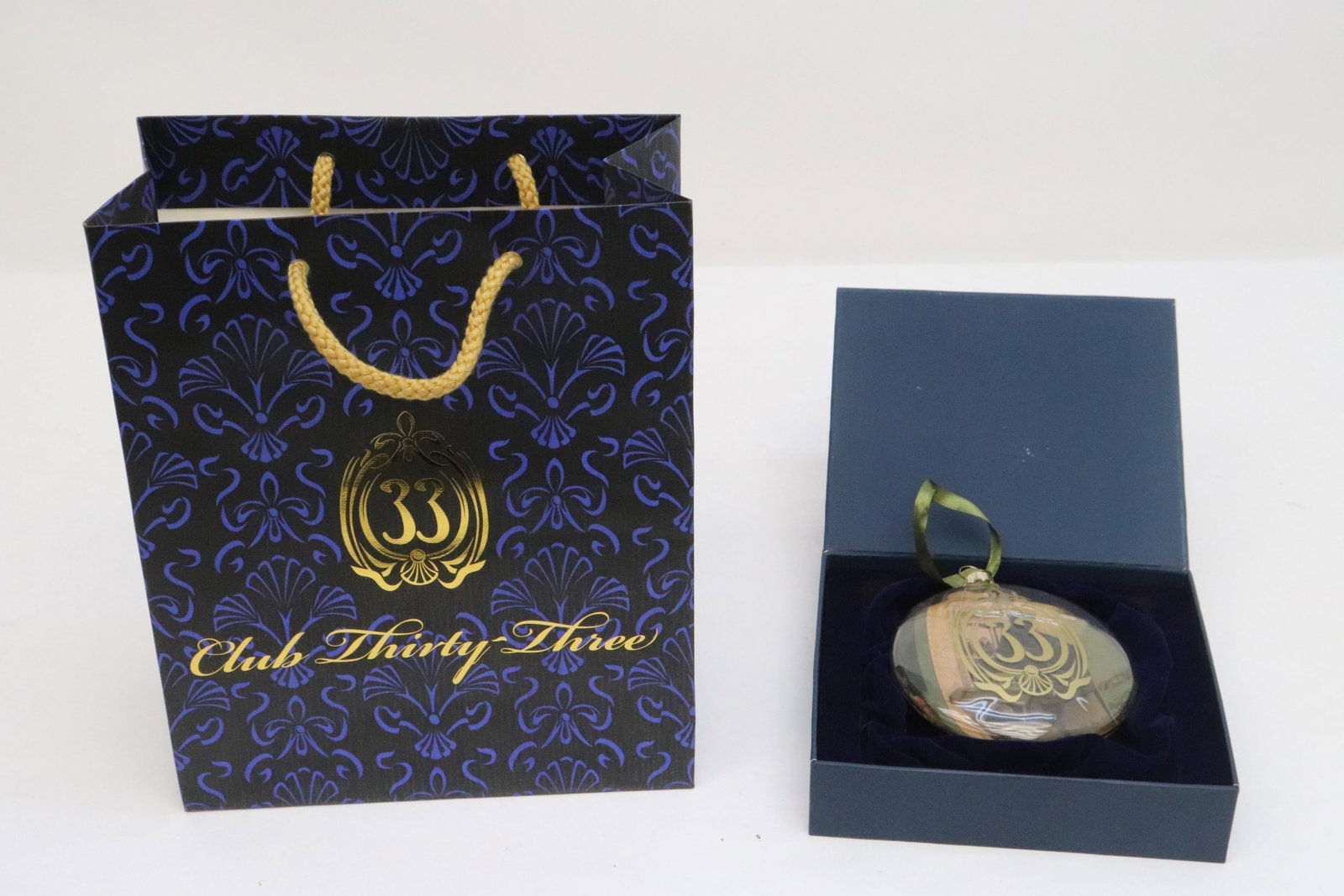 club 33 glass ornament for 50th anniversary: Beautiful c2017 club 33 glass Christmas large ornament for Disneyland 50th anniversary (1.3"x4.65"x4"), with 50th anniversary box and with a club 33 gift bag