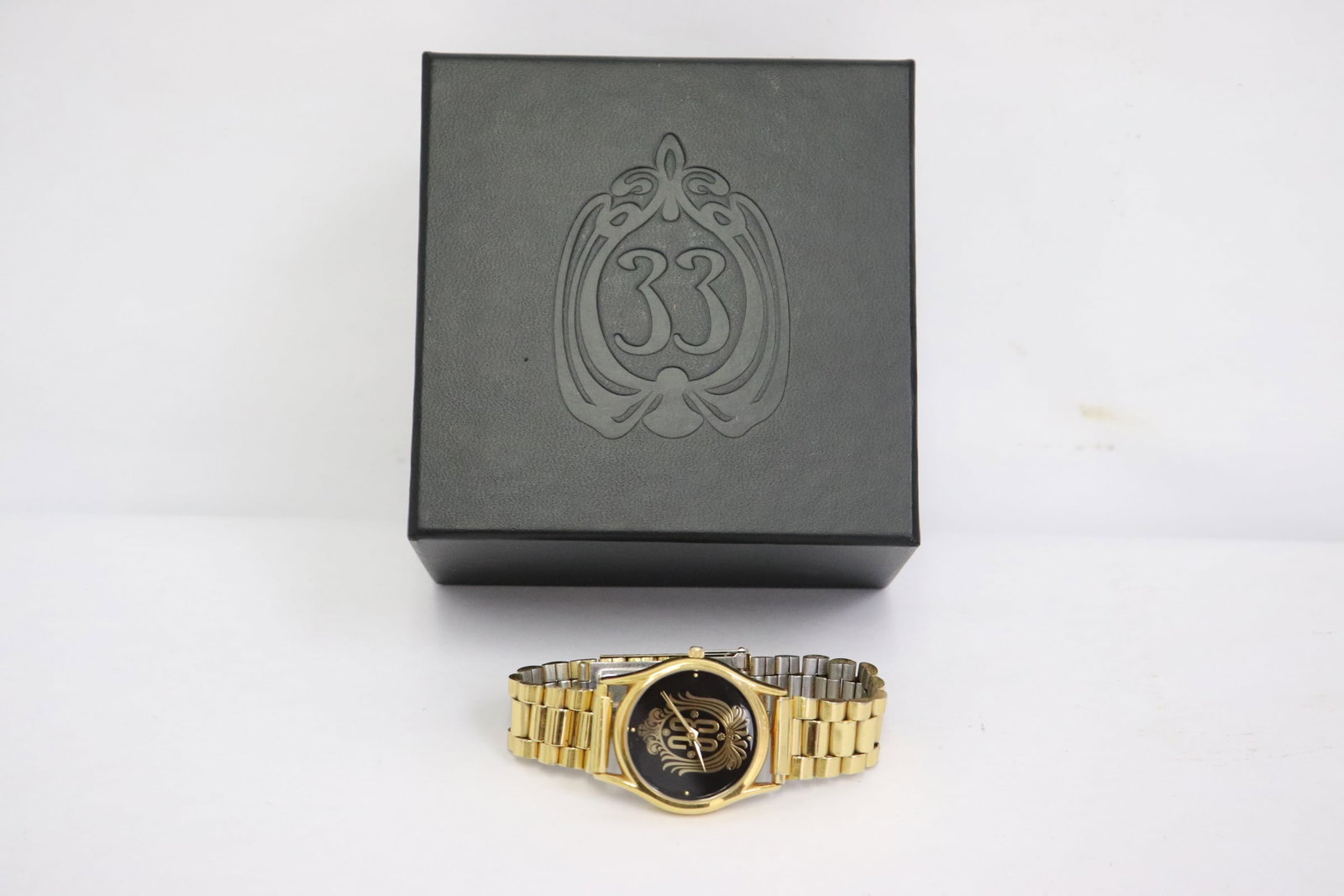 An early version of club 33 watch: An early version of club 33 watch, the face featuring club 33 logo, with jubilee band instead of newer version o leather band in original club 33 box, with normal wear