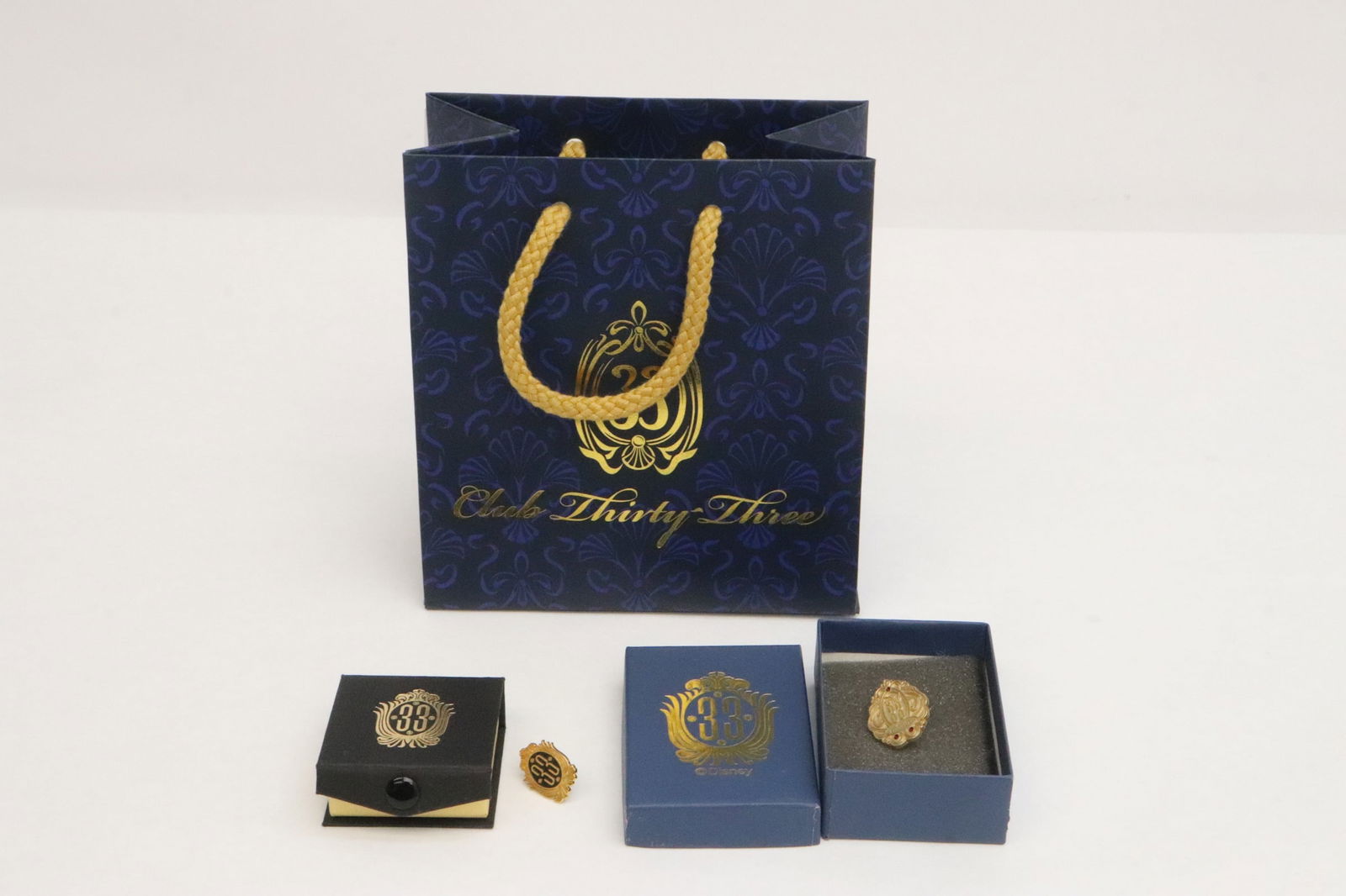 2 gold tone club 33 emblem pins with a gift bag (1 of 9)