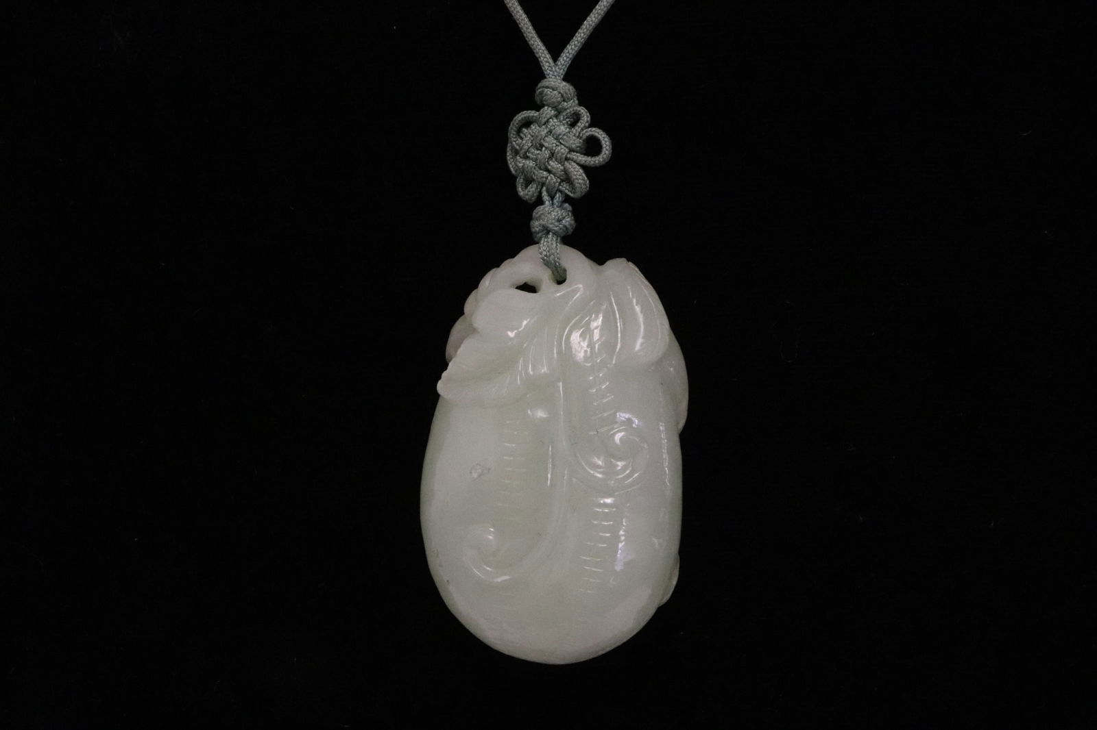 Fine celadon jade carved ornament (1 of 7)