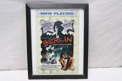 A framed "Berlin" film poster