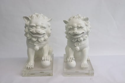 Pair Chinese blanc de shin fulions w/ Lucite base
