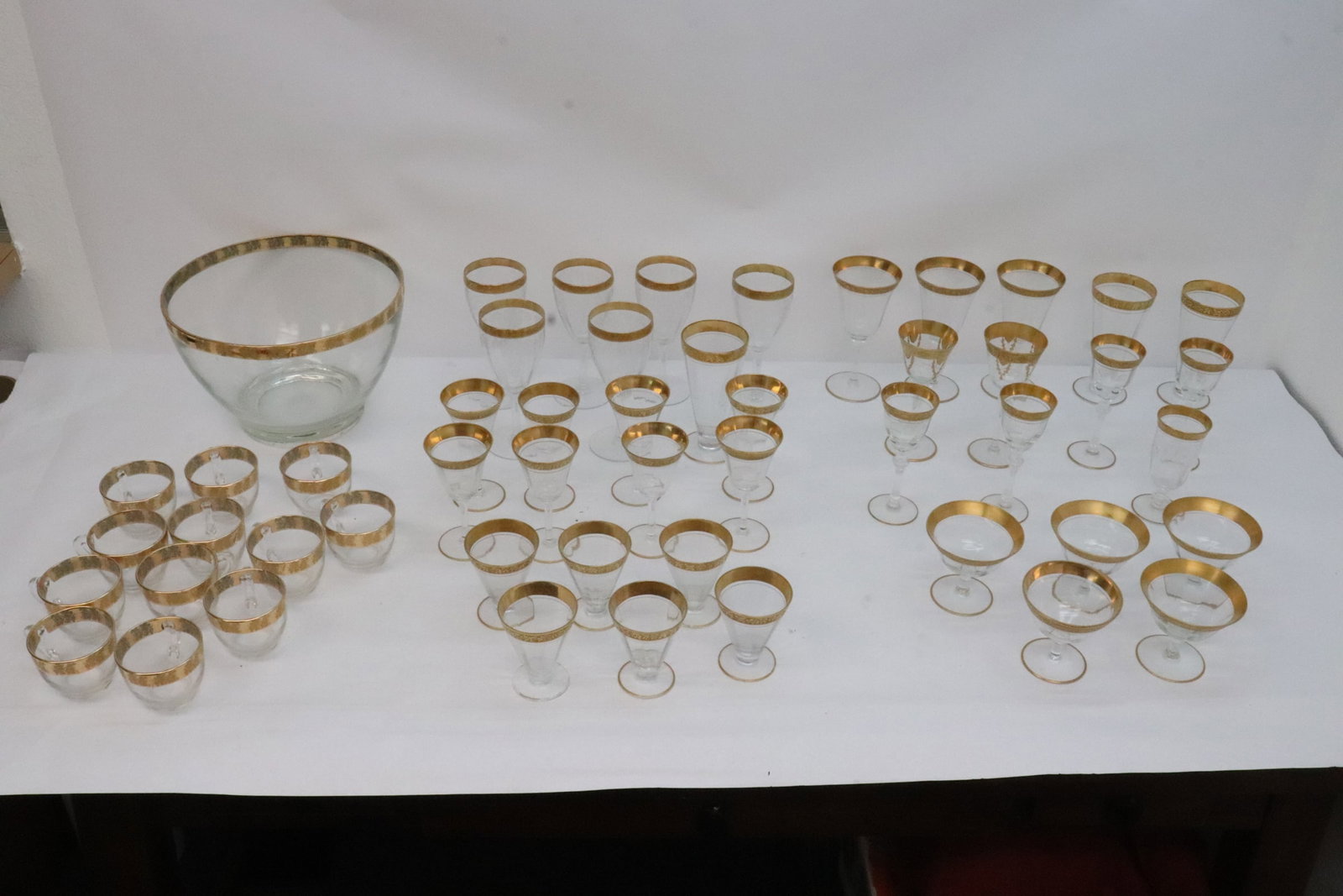 50 pieces French gilt wine goblets, punch bowls: 50 pieces French gilt wine goblets, punch bowls