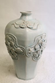 Chinese celadon vase with decoration in relief