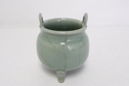 A Chinese crackleware porcelain tripod censer