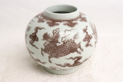 A Chinese red on white porcelain jar