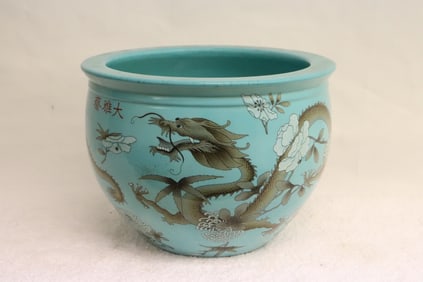 A blue background famille rose porcelain planter