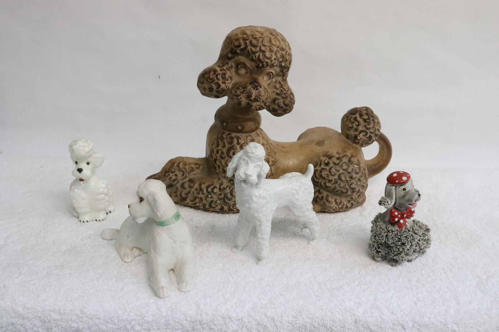 5 porcelain/ terracotta sculpture of dogs (1 of 10)