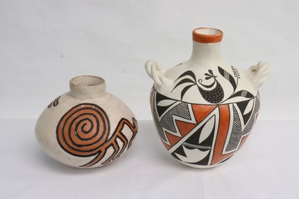 2 Native American pottery jars, signed