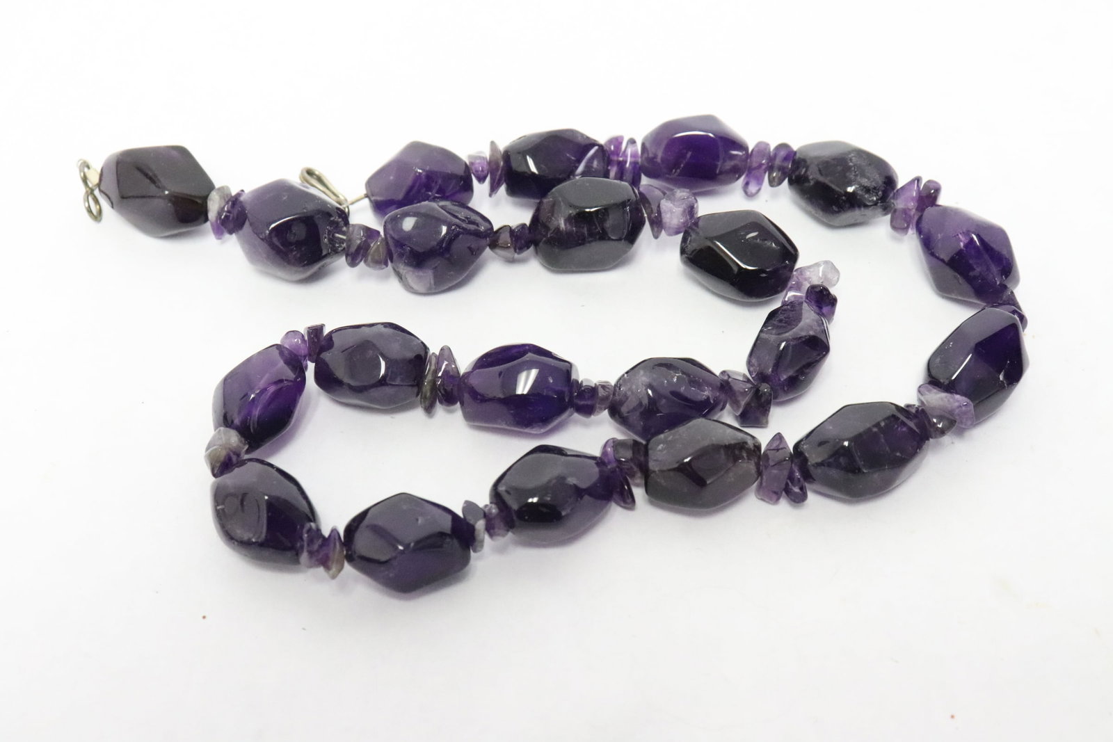 A large amethyst bead necklace: A large amethyst bead necklace, 21.5"L