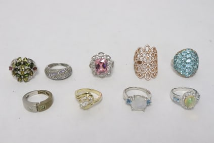 9 sterling rings with stones