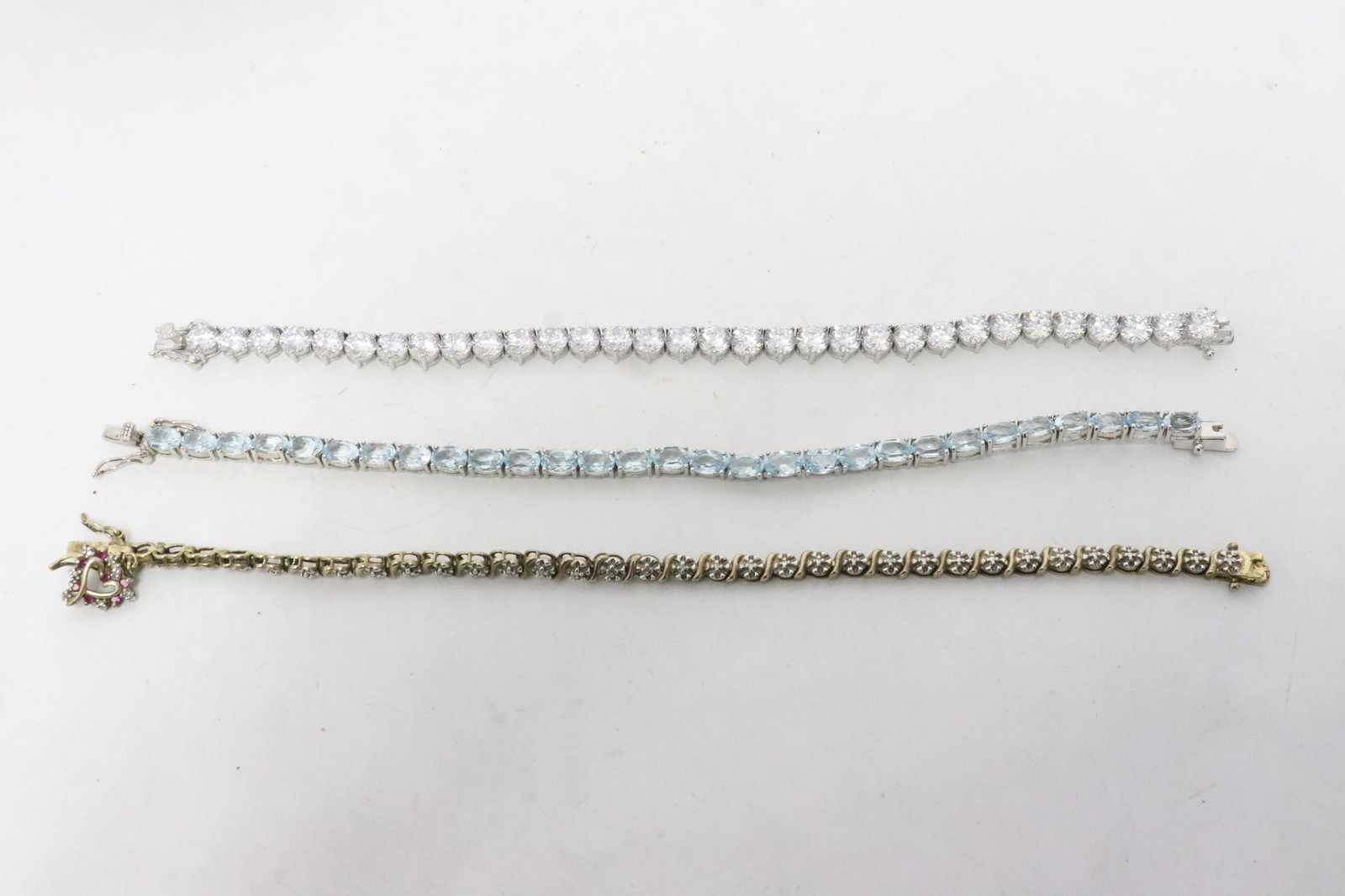 3 sterling bracelets: 3 sterling bracelets, 7.2"L - 7.4"L