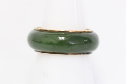 A green jade bangle ring with 14K Y/G band