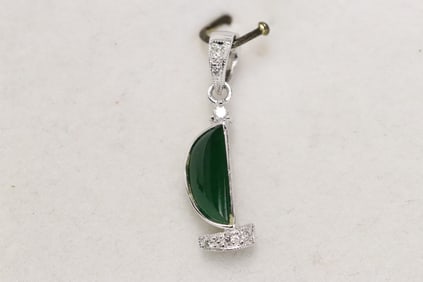 An 18K W/G jadeite diamond pendant w/ GIA report