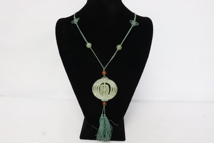 Chinese jade carved ornament with tourmaline beads