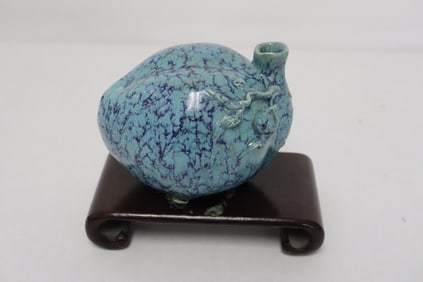 Unusual blue on blue water dripper