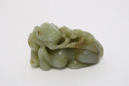 A celadon jade carved ram