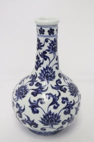 A blue and white porcelain bottle vase