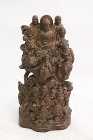 Fine wood carving depicting group of deities
