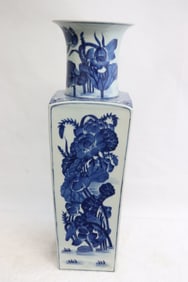 A blue and white straight vase
