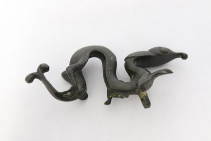 A possible silver inlaid antique bronze ornament