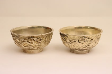 2 white bronze bowls
