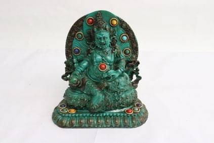 A resin carved deity
