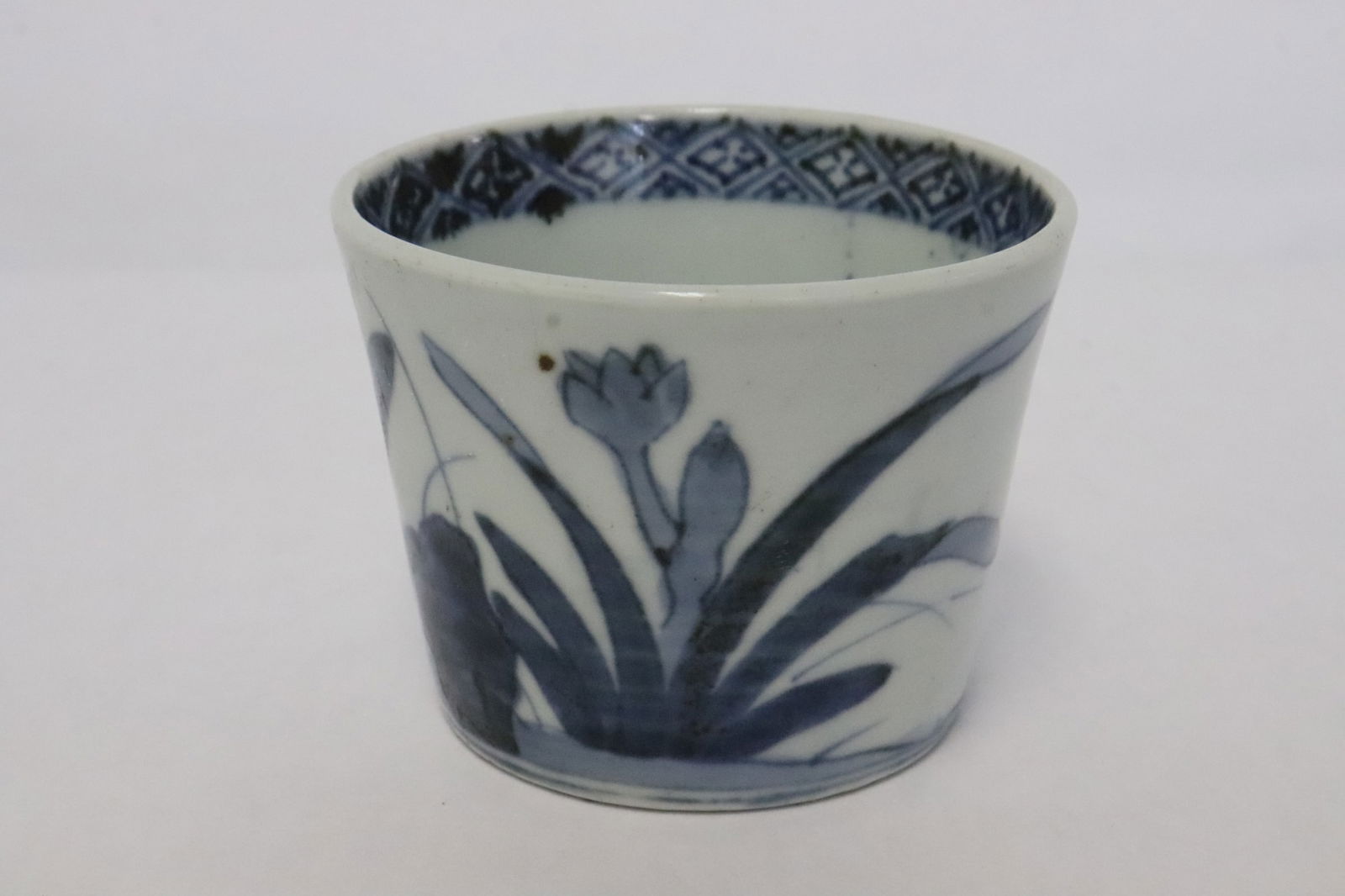 Korean vintage blue and white porcelain tea cup: Fine Korean vintage blue and white porcelain tea cup painted with bird and orchid, 2.35"x3.1"dia