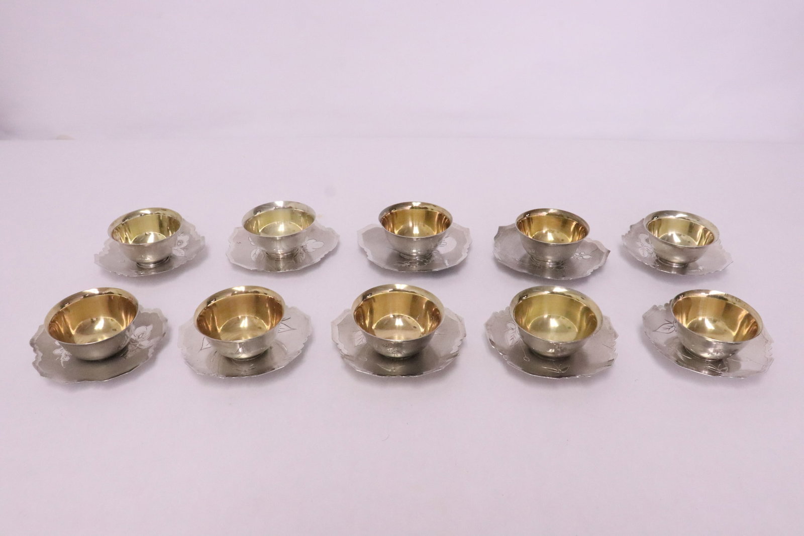 10 Korean vintage silver wine cups w/ underplates: 10 Korean vintage silver wine cups (1.18"x2.15"dia - 1.25"x2.1"dia) with underplates (0.5"x3.35"dia ea), total wt. 441gm