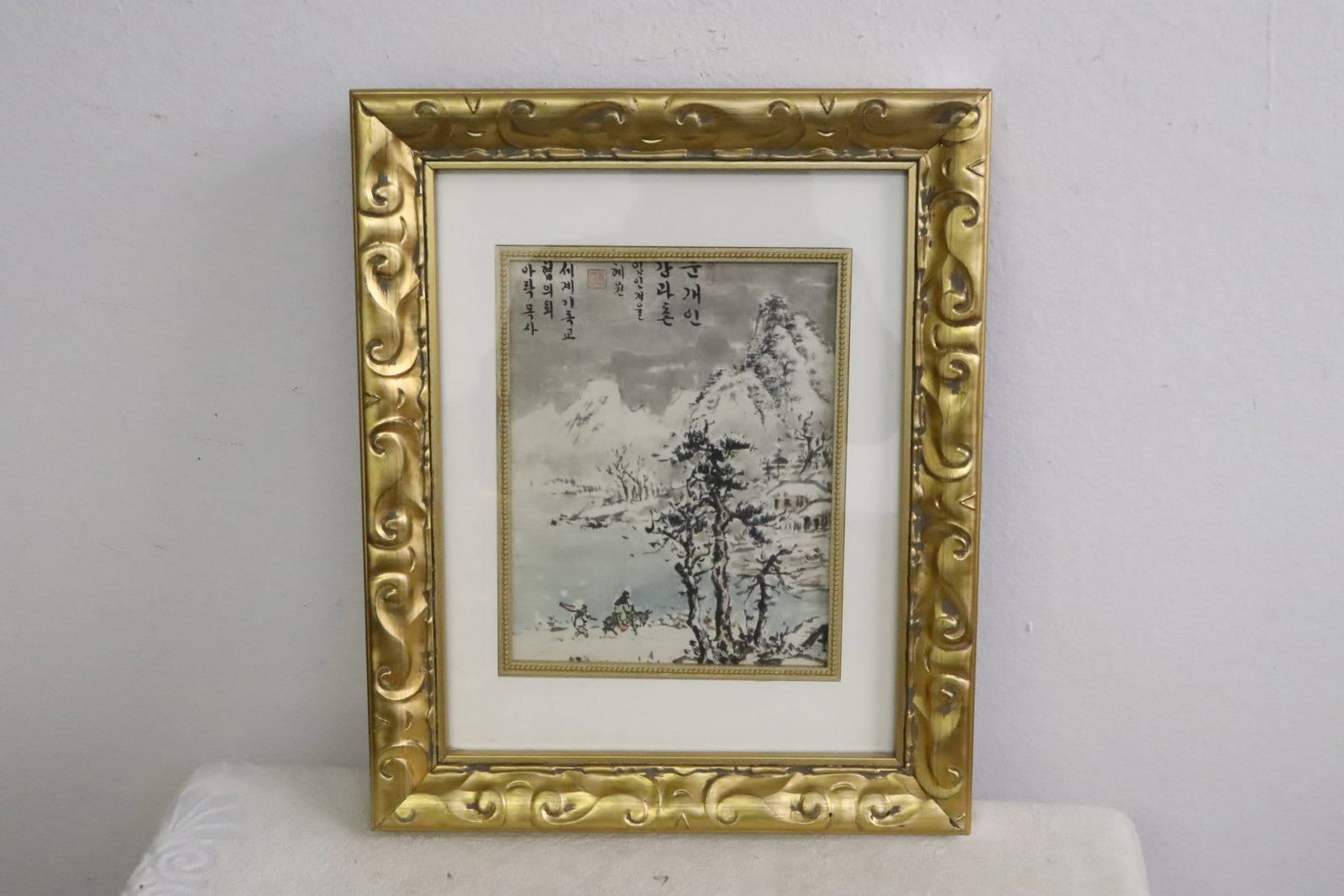Framed Korean watercolor painting: Framed Korean watercolor painting depicting landscape of snow scene with travelers, 9.4"x7.4"