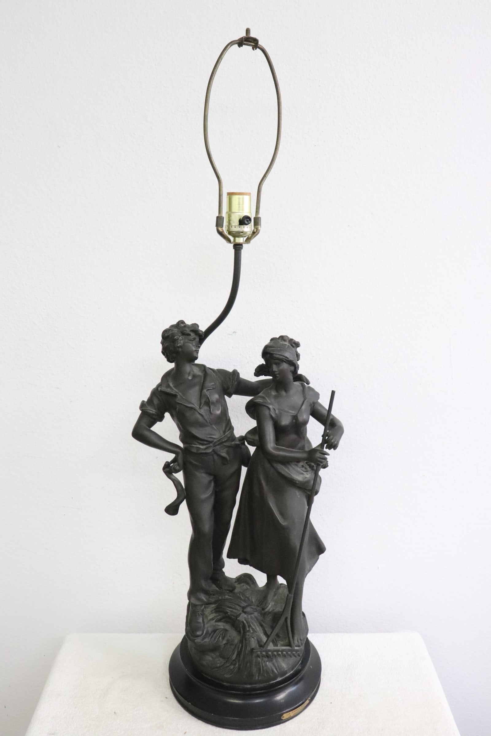 European bronze sculpture, made as lamp: European bronze sculpture depicting boy and girl, made as lamp (35.7"H)