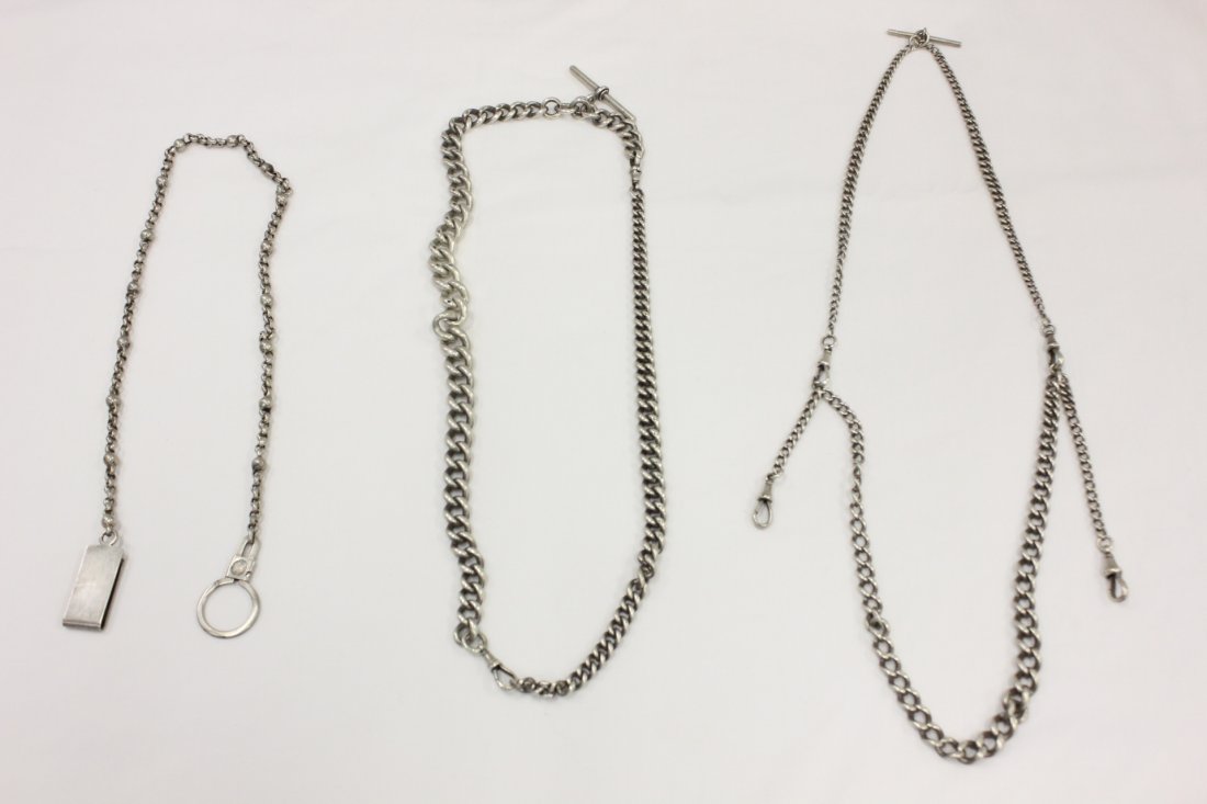 3 sterling pc, incl. a William Spratling example: A William Spratling sterling key chain, and 2 English sterling watch fobs, total weight 288gm