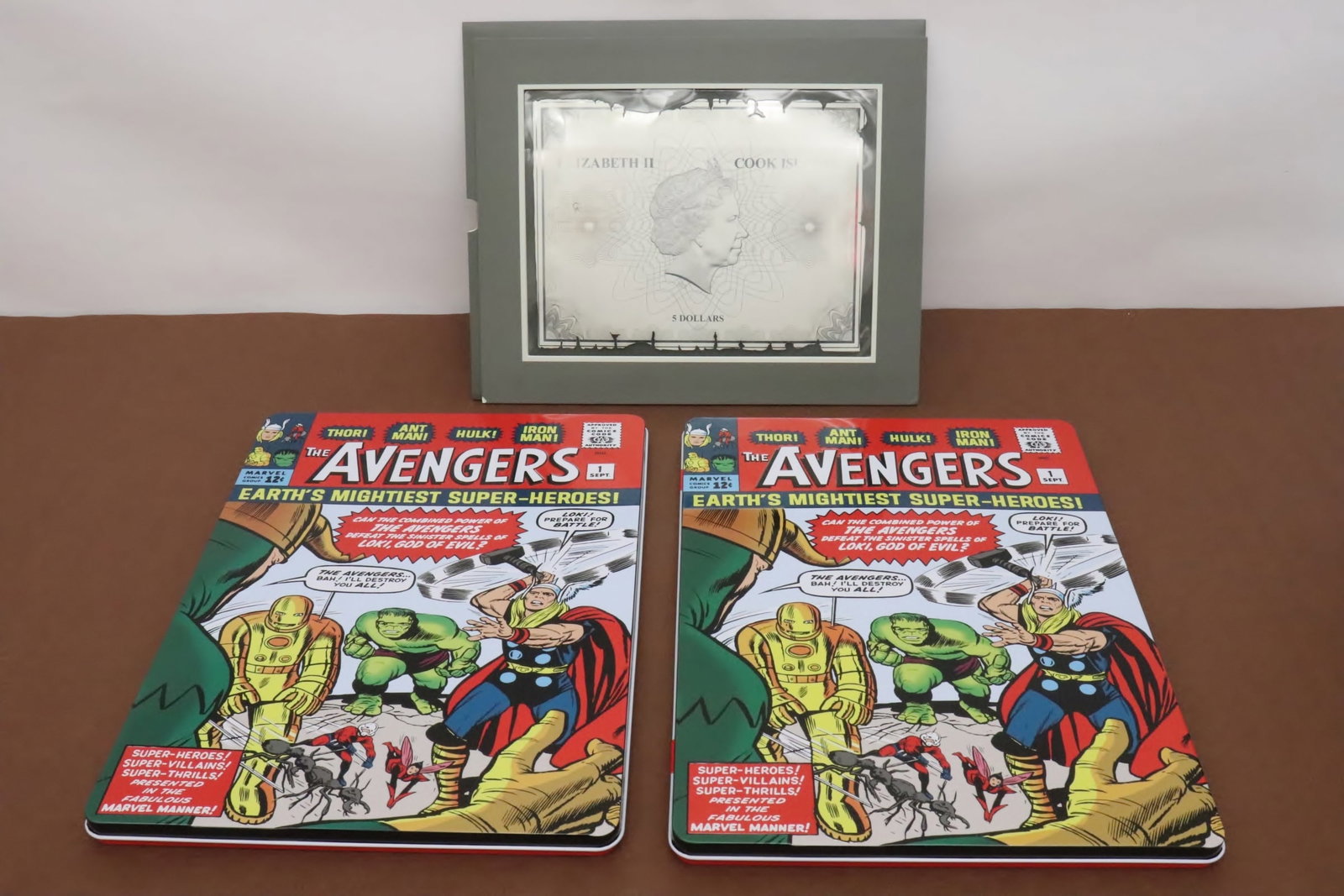 Two 1-oz pure silver comic covers, & a 1-oz silver map (1 of 12)