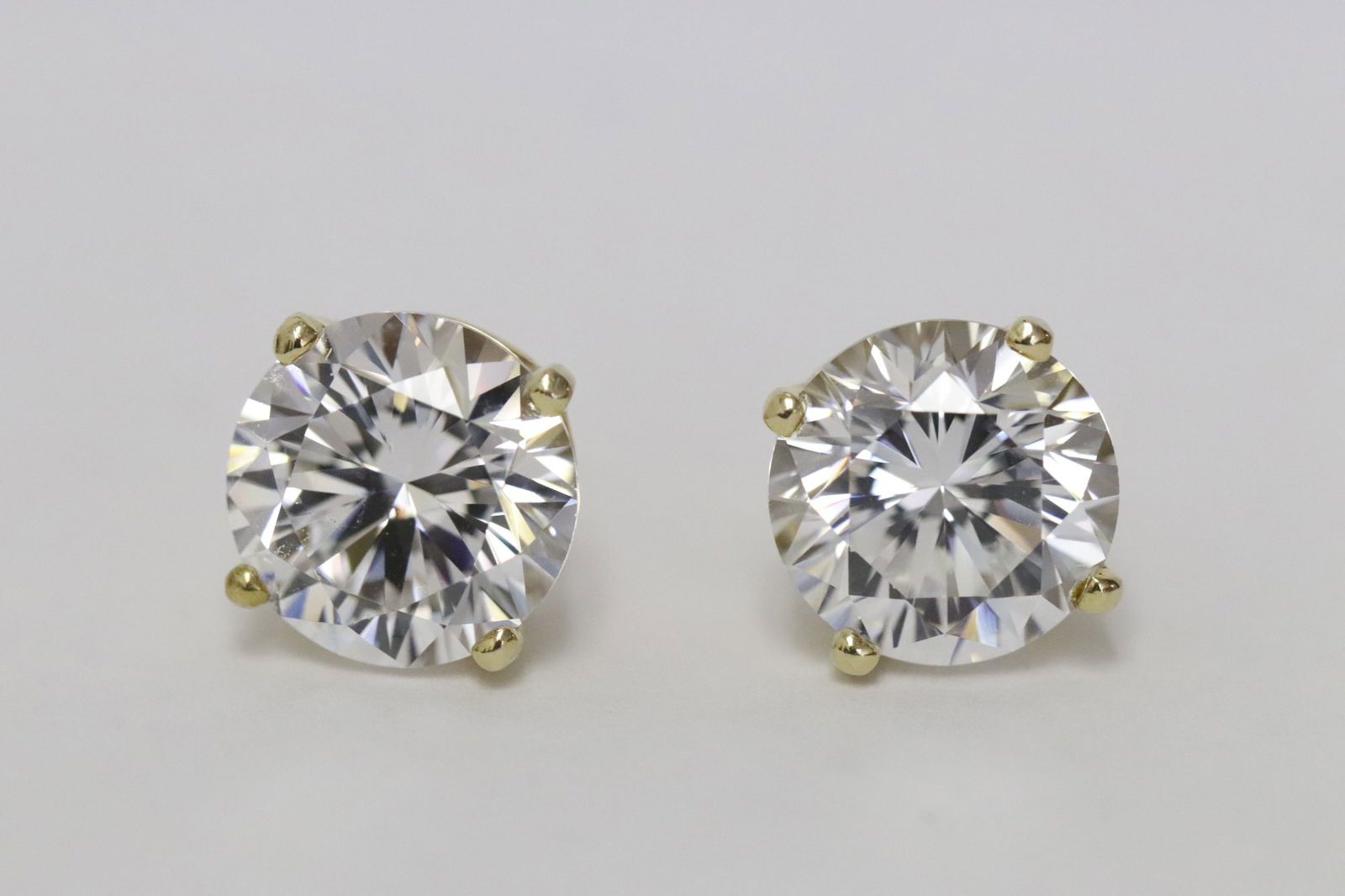 Pair 14K Y/G earrings with CZ (1 of 6)